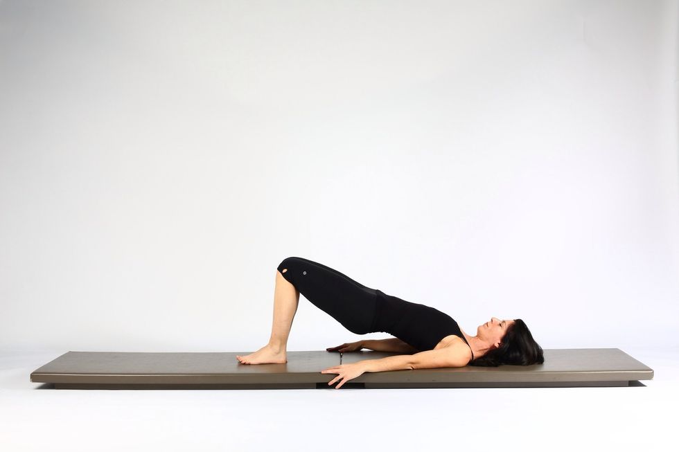 8. SHOULDER BRIDGE LIFT AND LOWER- Place foot back on mat making sure hips stay lifted and level.