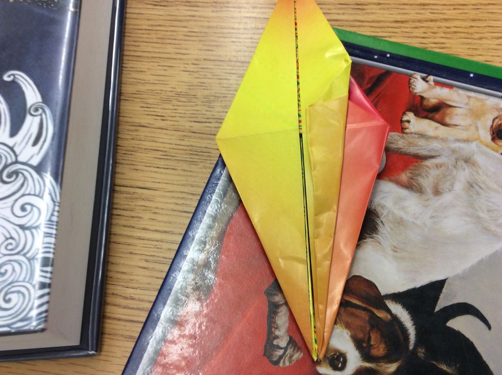 9. Fold the right and left side in the middle like in step 5.