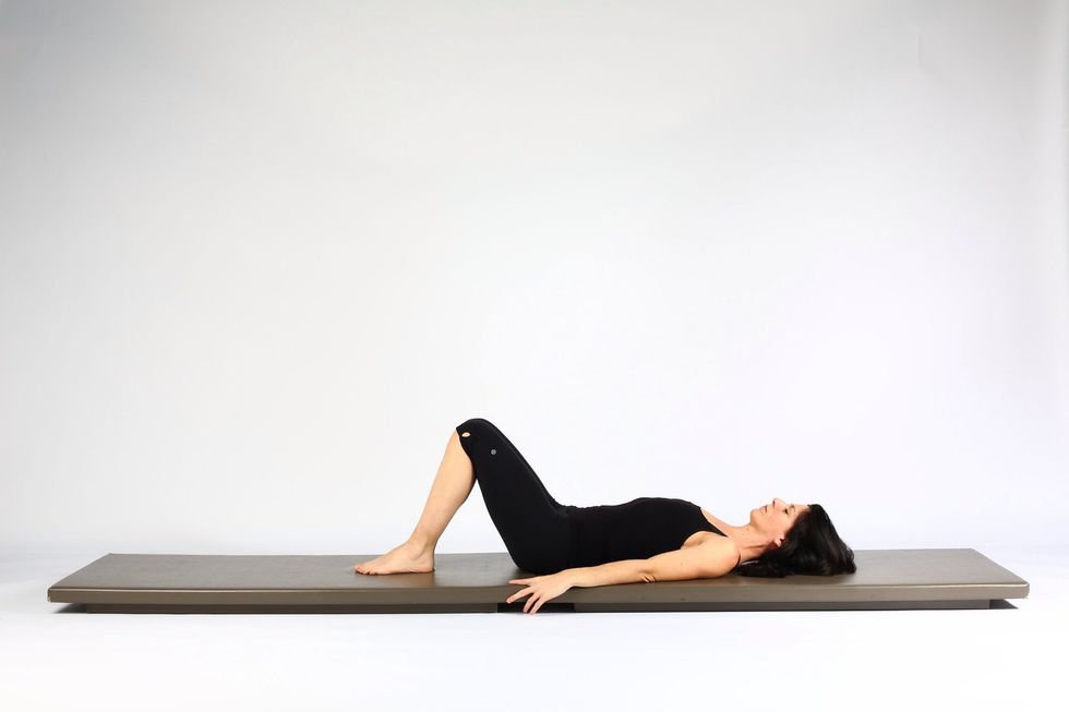 9. SHOULDER BRIDGE LIFT AND LOWER- Lower hips back to mat to finish. Repeat all variations on other side.