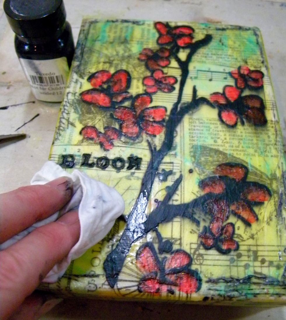 A baby wipe does the job at cleaning up the excess paint. Let everything dry.