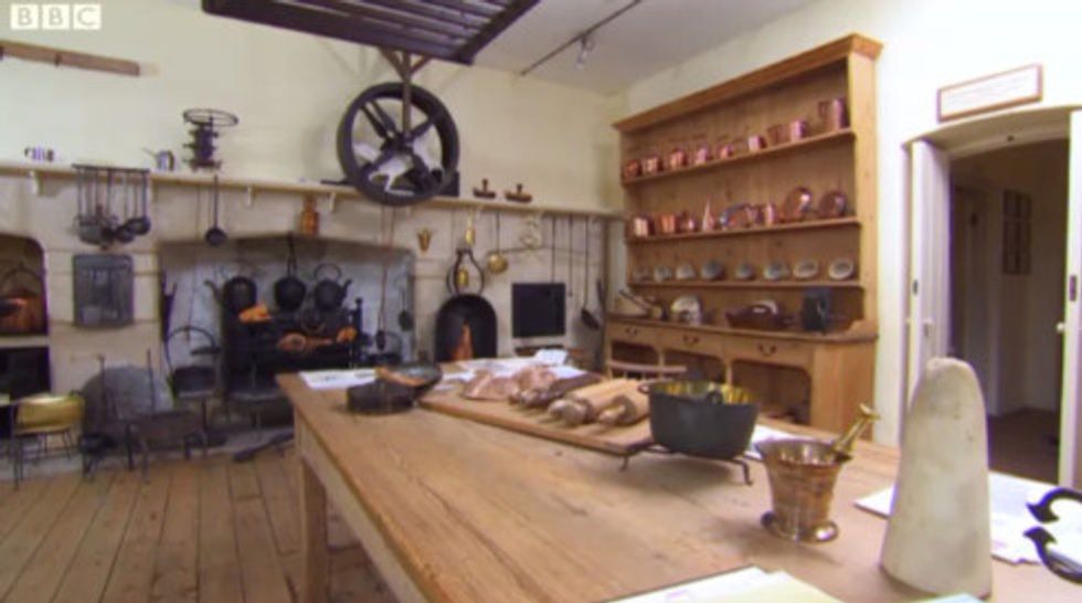 A beautiful hutch, again with lots of copper, and a huge pulley to help with heavy iron pots hot from the fire.