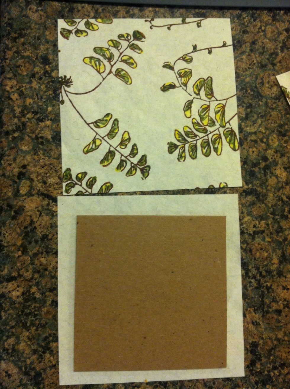 A bit bigger than the cardboard