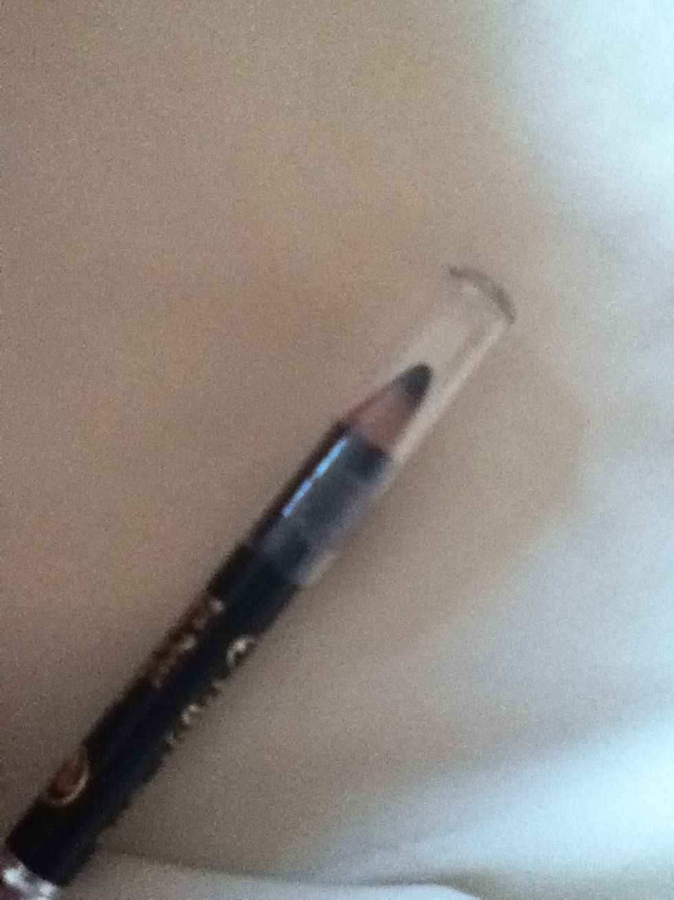 A black liquid or pencil eyeliner. I would advise makeup beginners to start off with pencil, but once you have got the knack of applying it neatly, use both pencil and liquid.