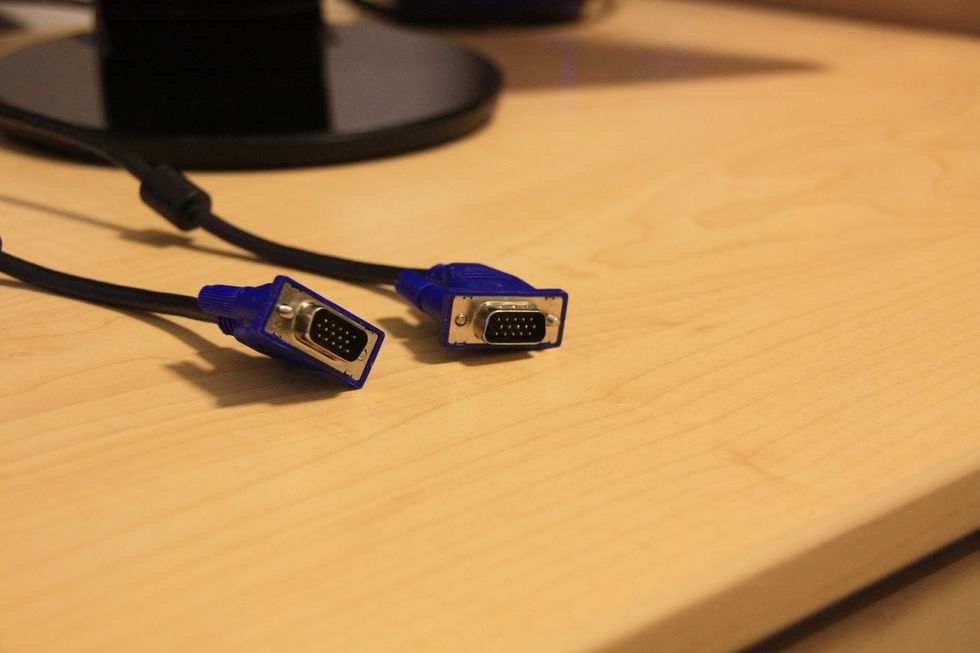 A cable. Mine is VGA.