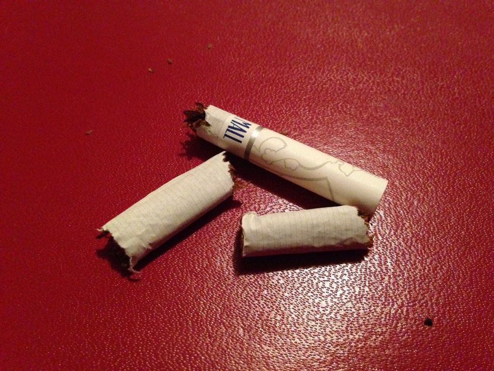 A cigarette I took from my husband and than I broke it.