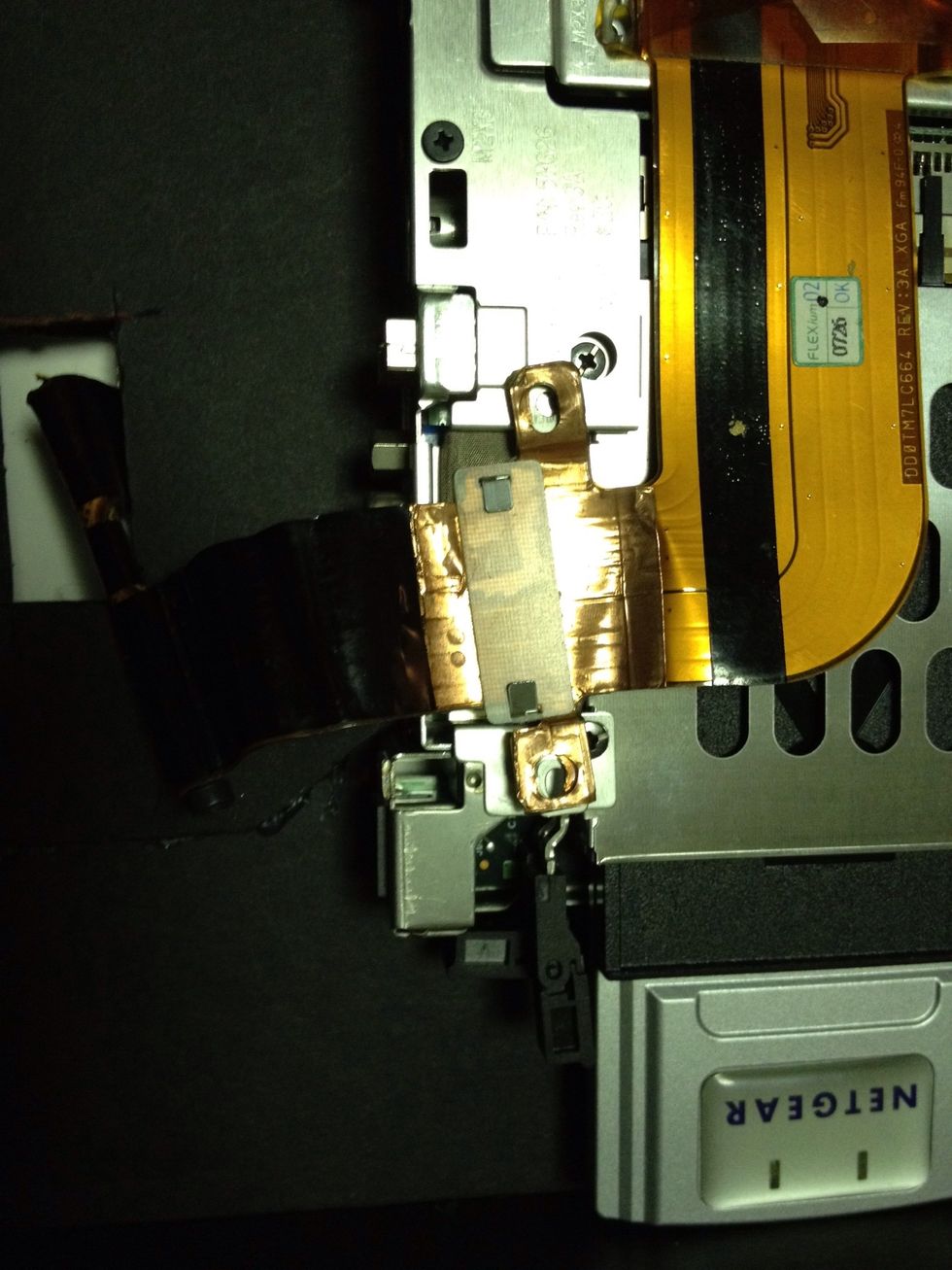 A close up of LCD connected to system board. Also note the added wireless card since this unit didn't have built in WiFi.