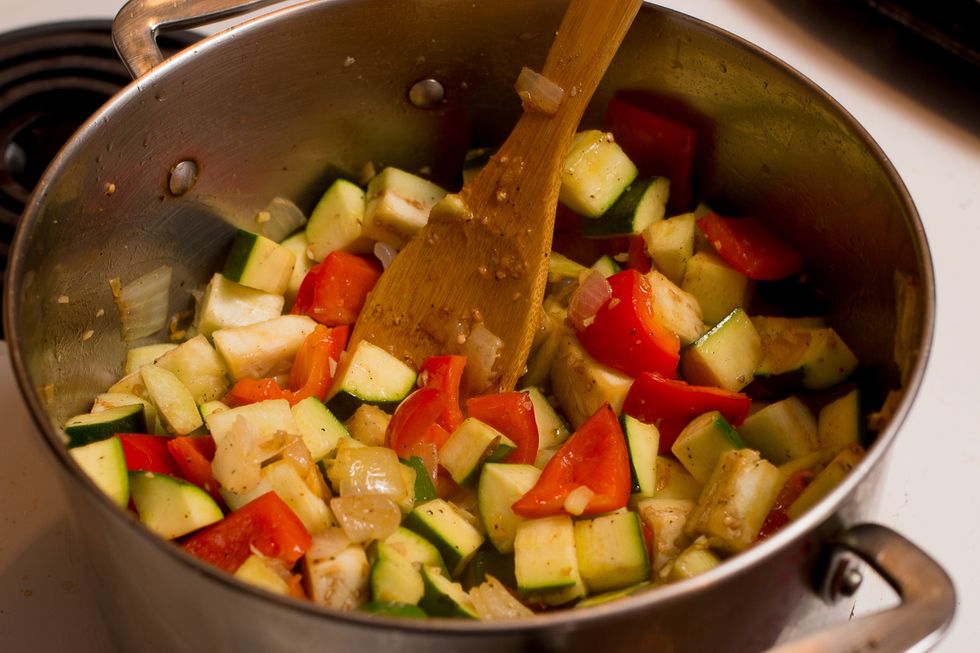 A couple minutes later, add the zucchini and eggplant.