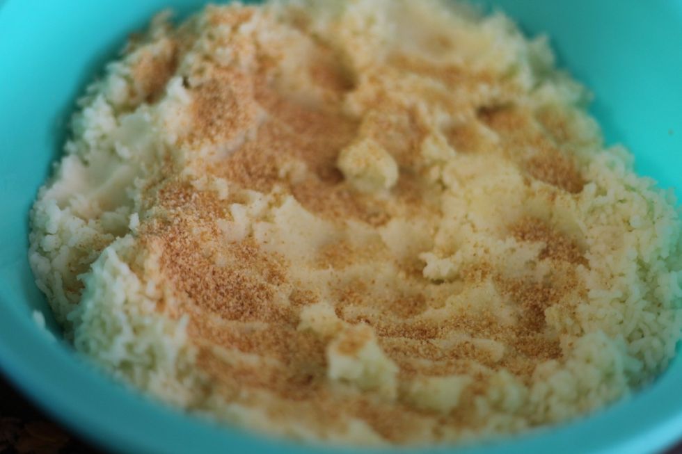 A cup of breadcrumbs and by now your potato should be cold enough to mix. Don't burn yourself please. Or just use a spoon.