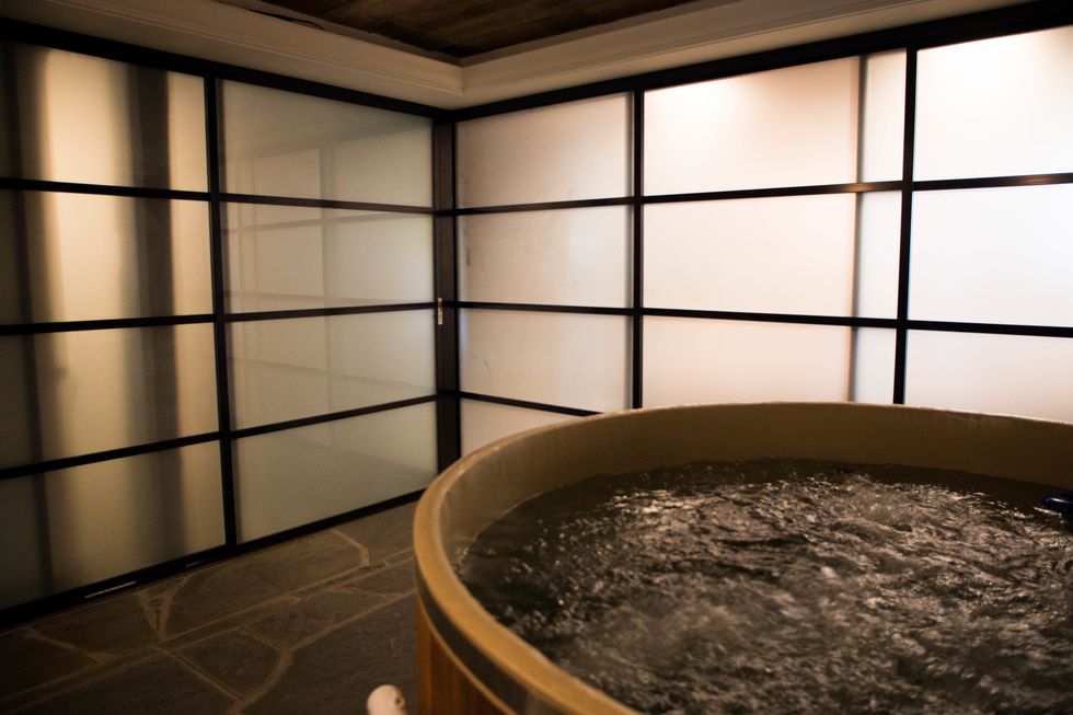A favourite way to enjoy the hottub is to turn off all lights other than the fireplace and lights behind the glass walls