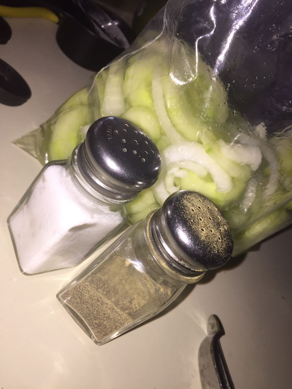A few dashes of salt and pepper. Incorporate thoroughly in the bag.