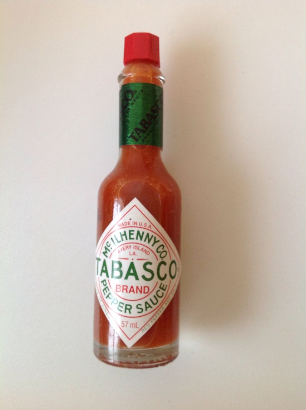 A few drops of Tabasco sauce makes it ideal. I love the stuff so I put between 8 to 10 drops.