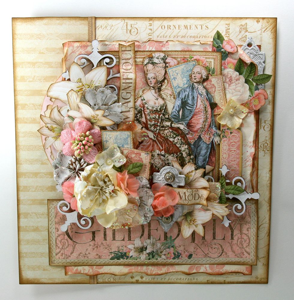 A few more smaller flowers layered on to finish off the floral section.