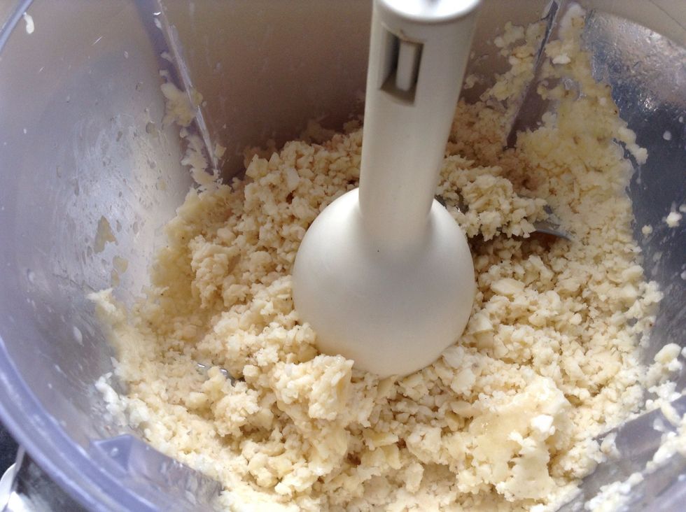 A first you'll get frozen banana crumbs. Scrap downs the sides and keep blending.