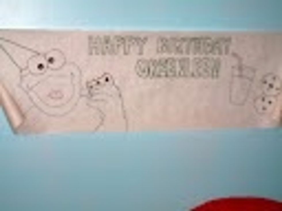A friend did a freehand drawing for a banner all the children could sign.