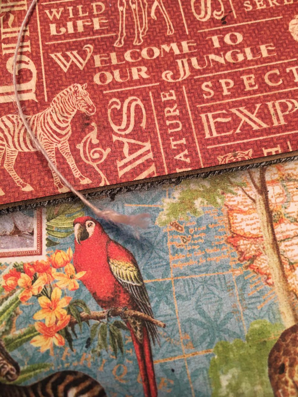 A fun look to finish the ends of button string is to tie it in to a knot, cut the string on the end to about 3/8" and then use your fingers to roll and untwist the end to give it a frayed look.