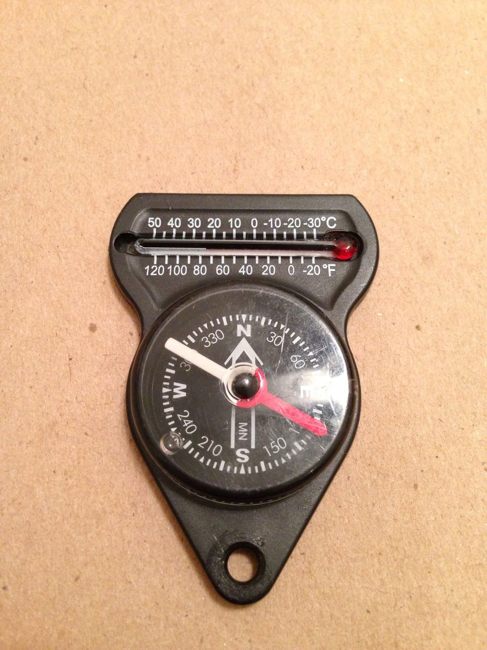 A good working, small compass. (REI sells this for about $5.00).