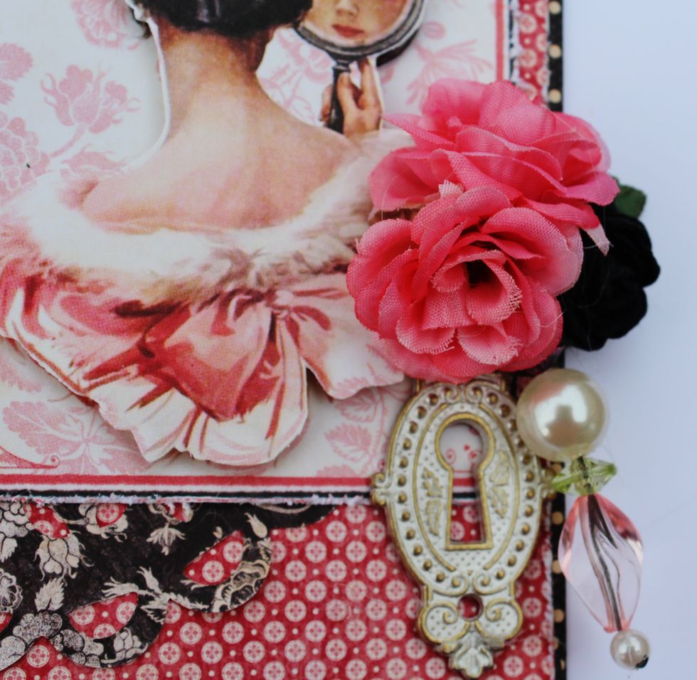 A Graphic 45 Lock and some pearls.