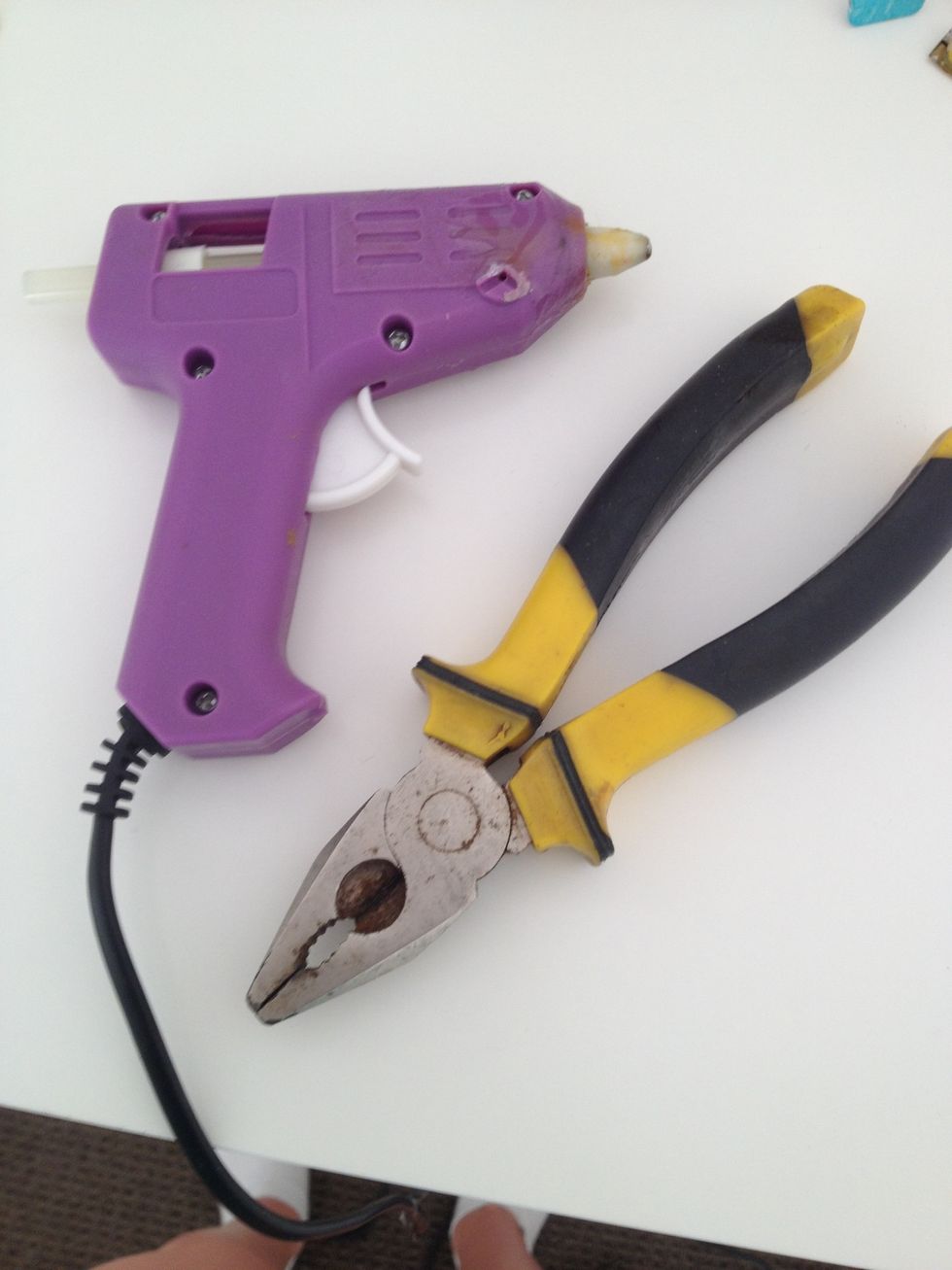 a hot glue gun and some pliers.