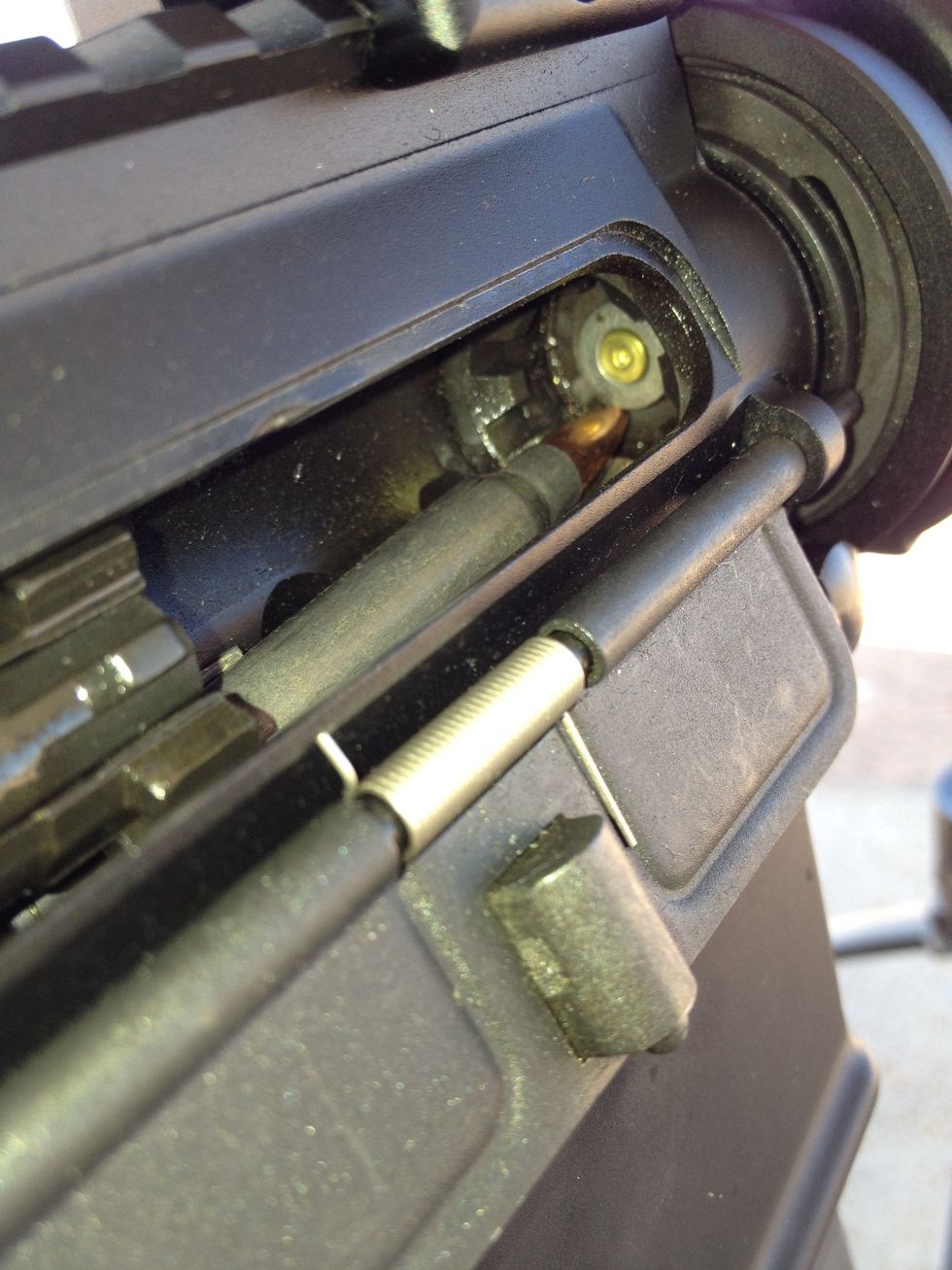 A jam! The chambered bullet has most likely been shot. This would leave just a jammed case, but we're going to verify that first.