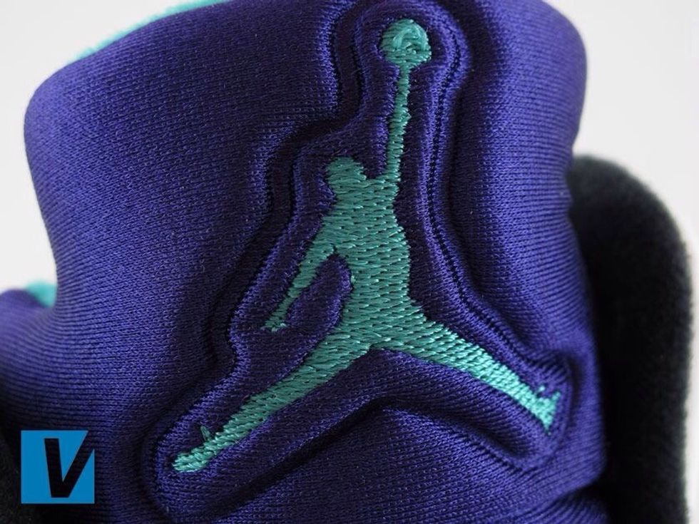 A Jumpman logo is located on the upper of the tongue of Jordan 5's. Check that the proportions of the Jumpman are correct and that the embroidery work is neat and cleanly finished.