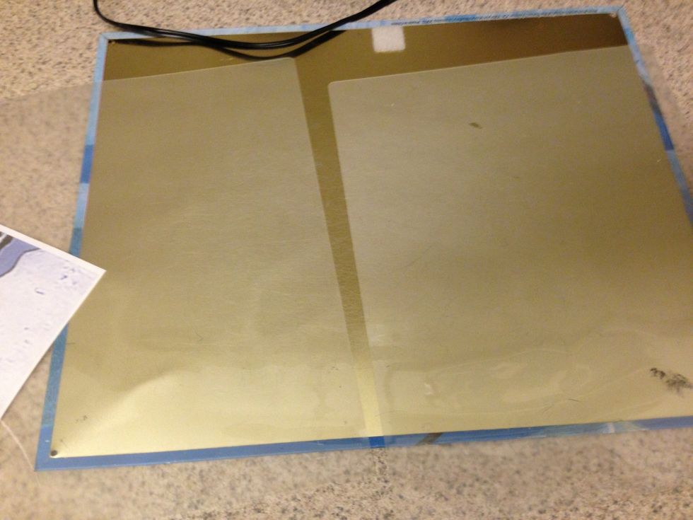 A laminating sheet "ripped" in half