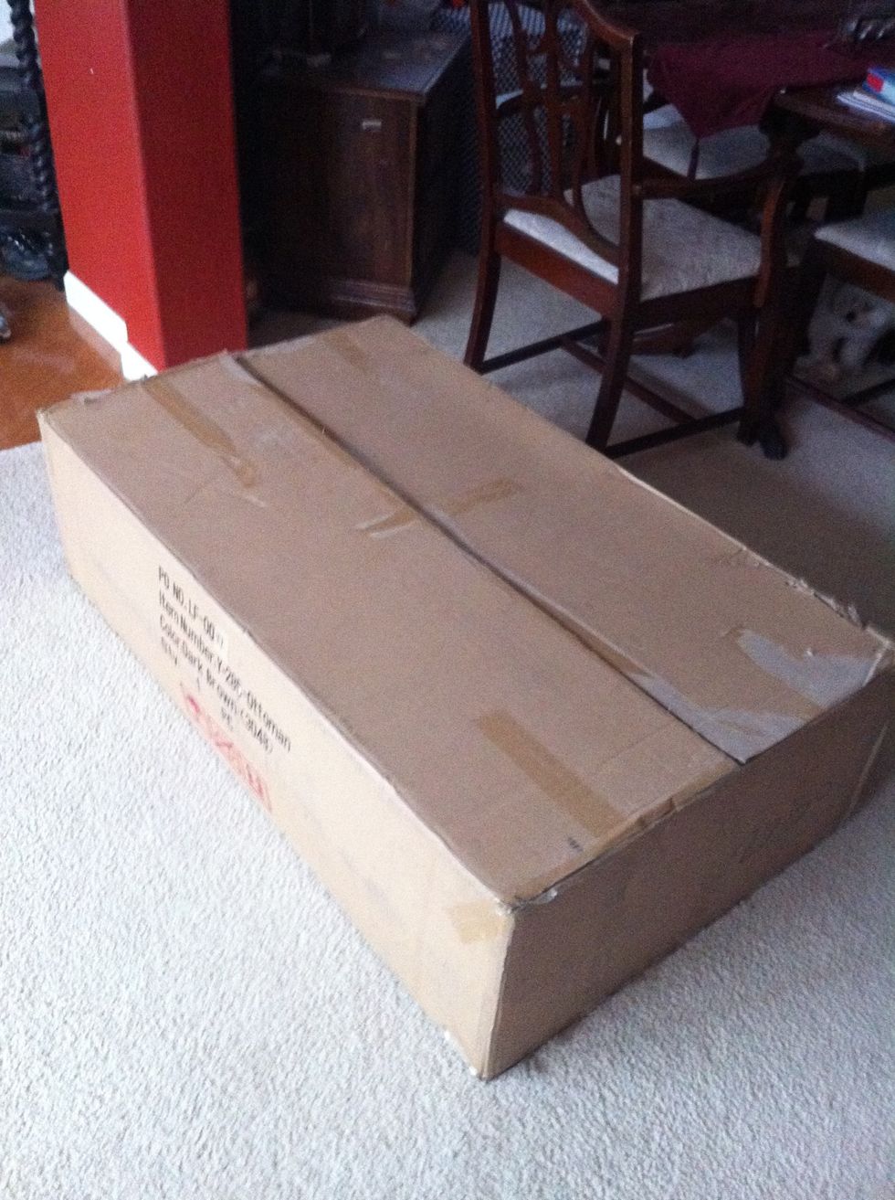 A large box from a package we ordered. But you can use any large box and cut to fit for an opening, even if all sides are even.