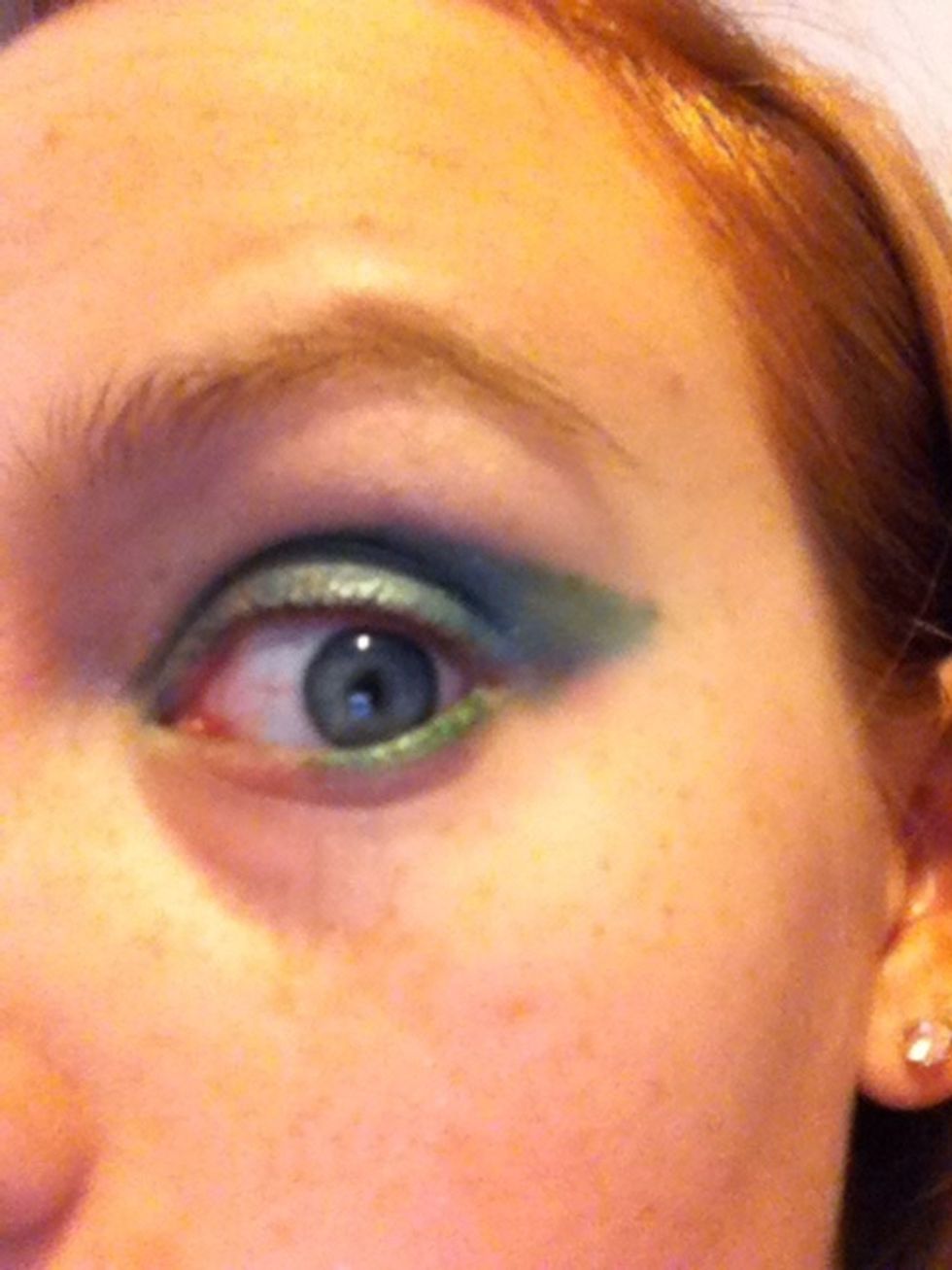 A little under the eyes and over, but you can't see the top green. Oh well! Now I'm going to add a little black liner to make it all look a little more solid.