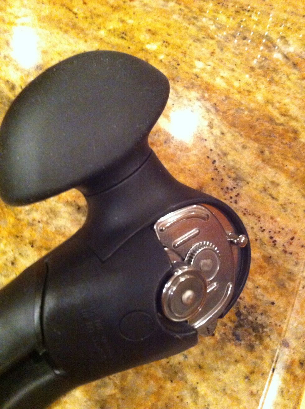 A manual can opener. Mine may look like it's electrically-powered but it's just fancy-looking, that's all. Count on having no electricity while packing!