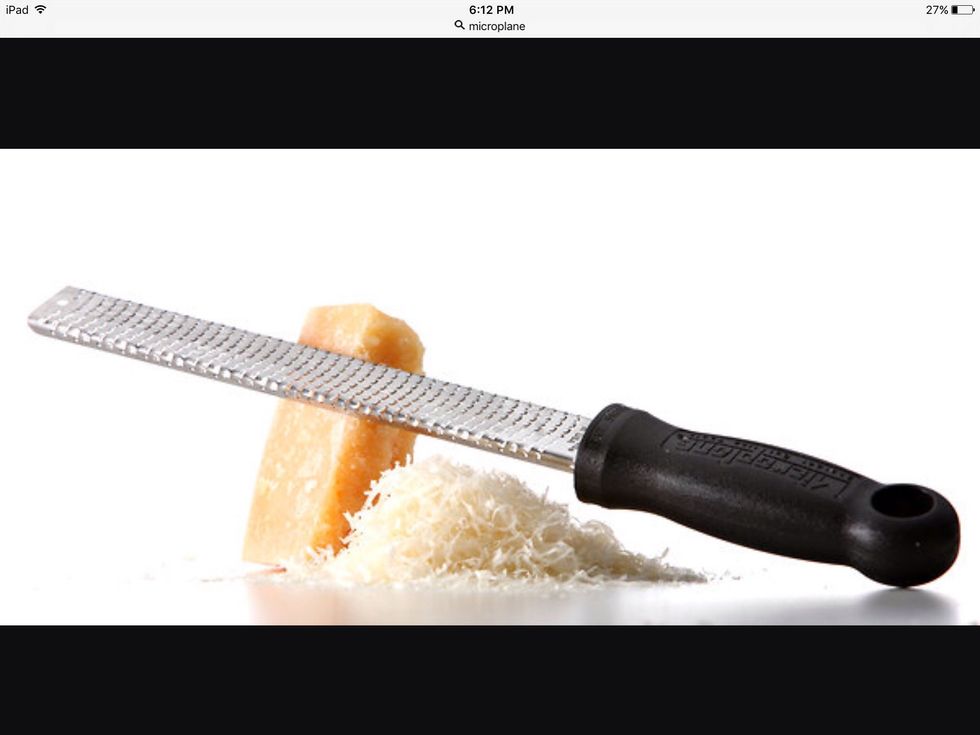 A microplane is used to shred food. I can use this to shred cheese.