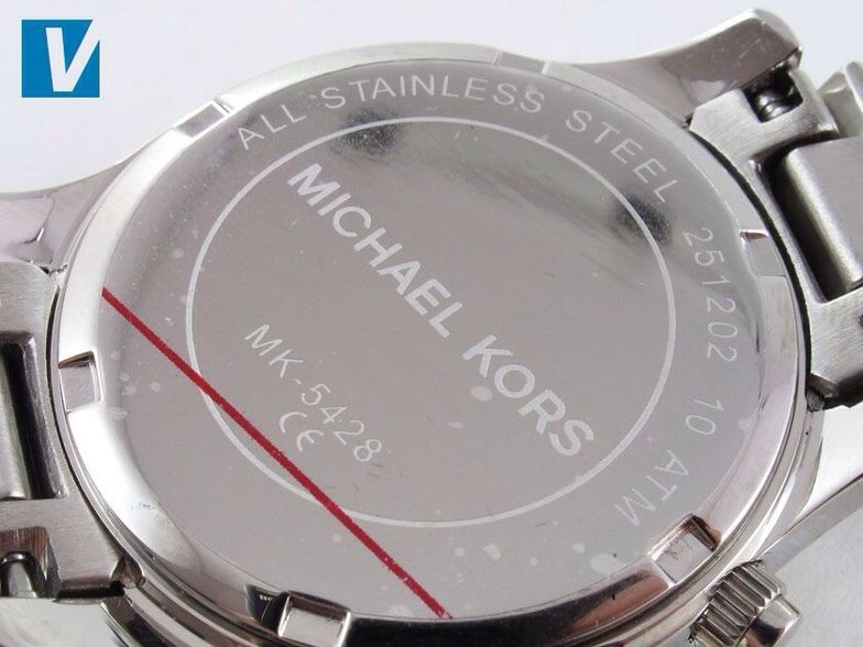 underkjole Elektrisk Hele tiden How to spot a fake michael kors watch - B+C Guides