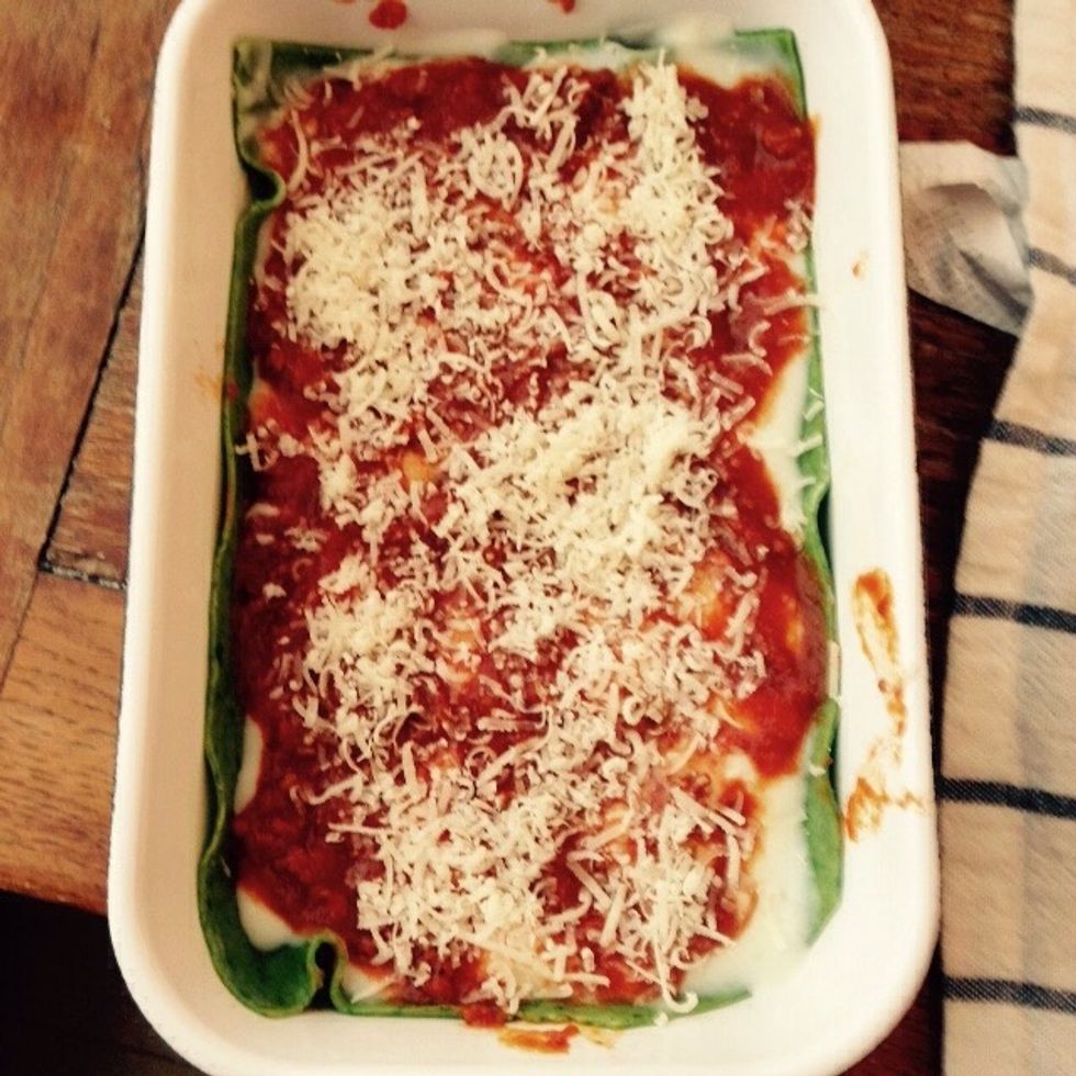 A nice dust of freshly shaved parmesan will complete the layer. Cover with a pasta sheet and repeat.