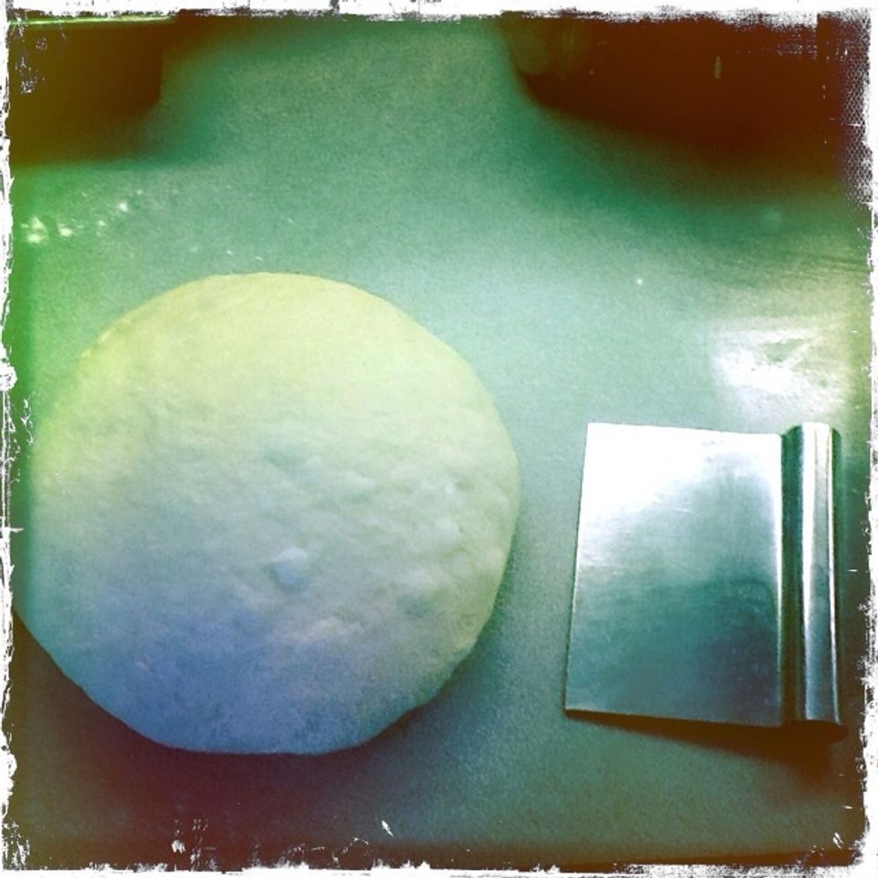 A nicely rounded ball. I use a bench knife but a chef's knife would work.