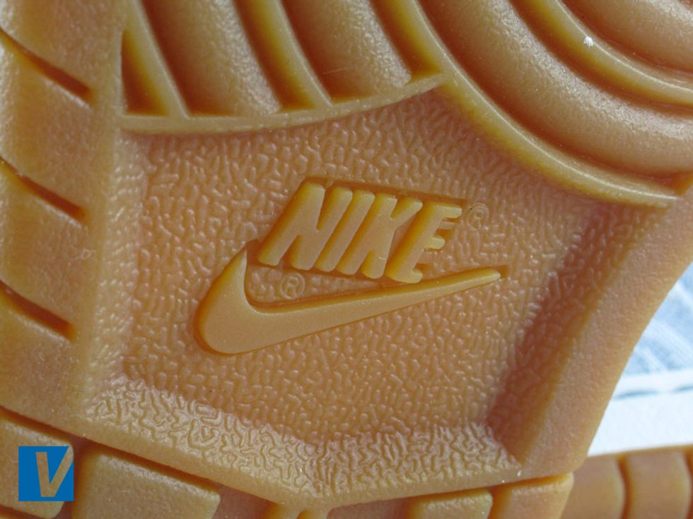 A Nike logo often features on the sole of Dunks. Check that the positions of the registered trademark circled R's match those shown. Also check the size and shape of the letters and the Swoosh.
