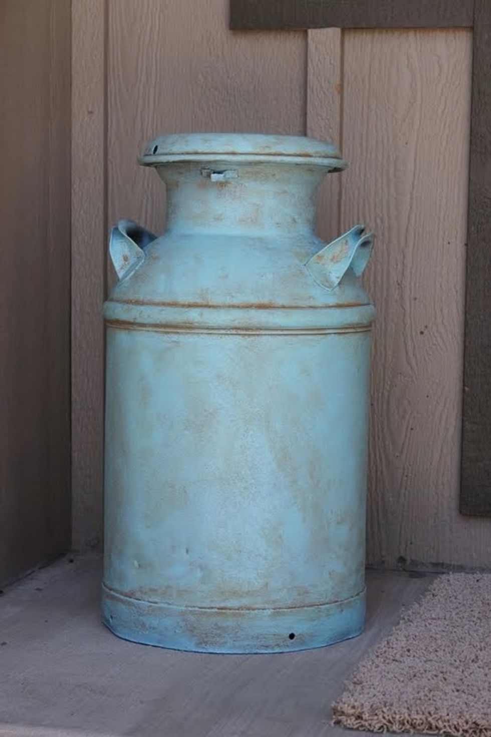 A old milk can in back in the day.