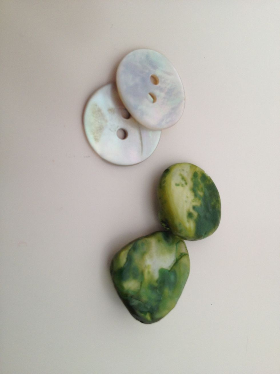 a pair old things that you like, I've used beads, studs, buttons and bits of old shell before.