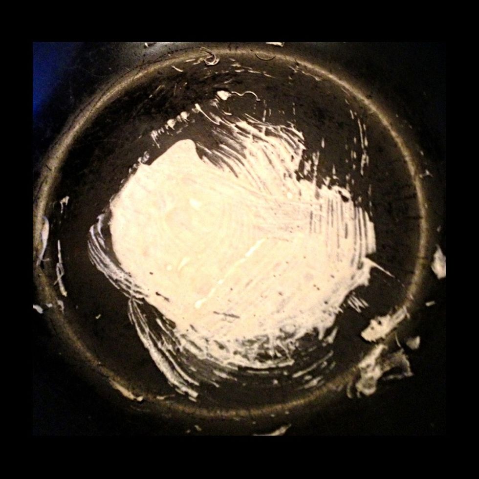 A pan with a good non stick surface is key! You want to avoid using any grease or oil if possible. Heat to med/med-high, and use a pastry brush to quickly brush a thin layer of batter in the pan.