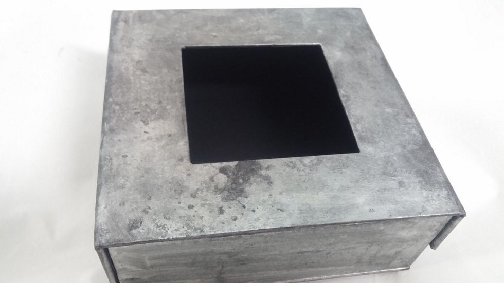 A picture of my faux metal look with stains. It is hard to believe this this kraft board!