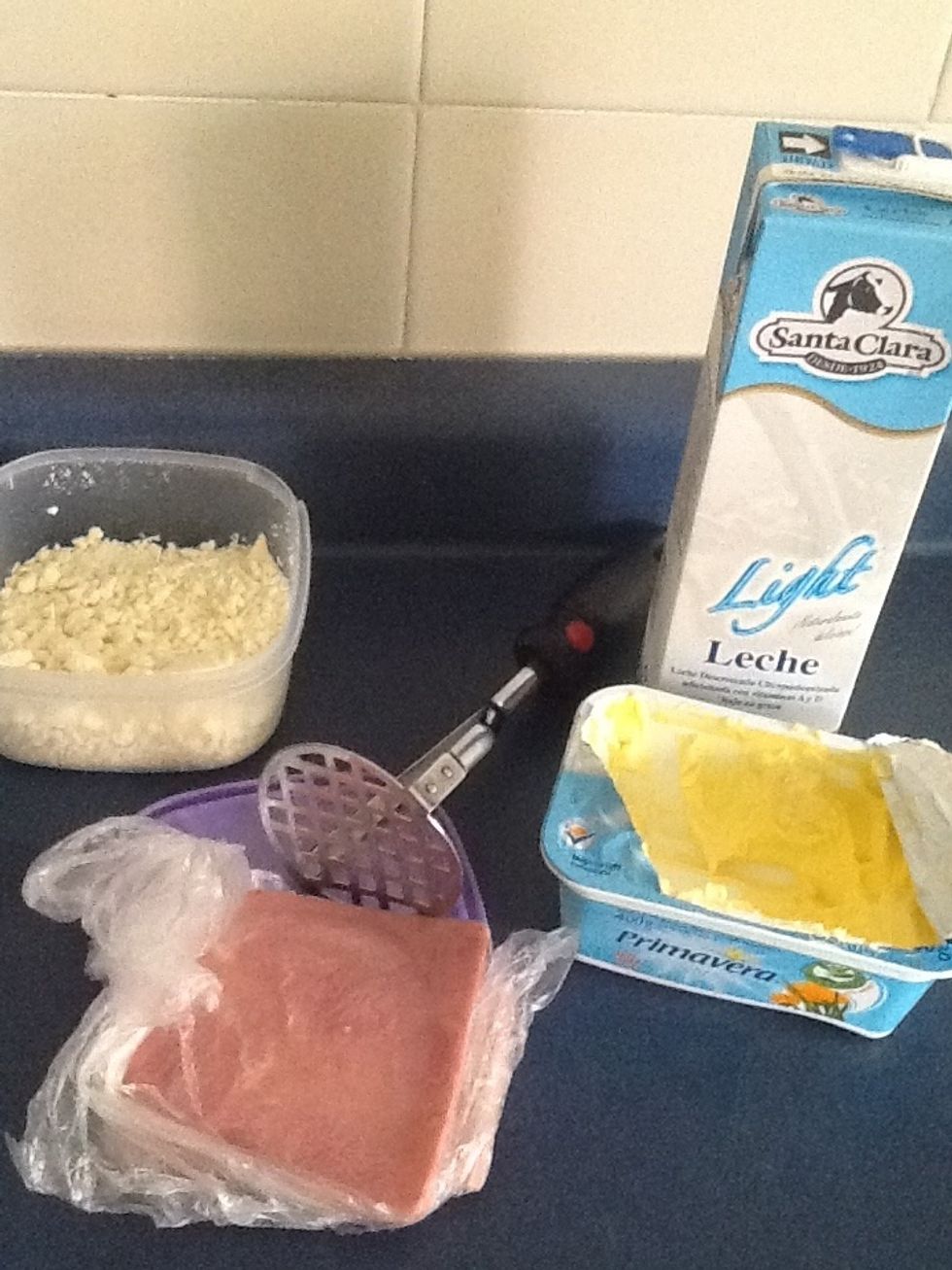 A picture of the ingredients. The spatula is a special one for smashing. (if you dont have one use something hard to do it)