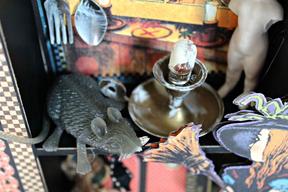 A plastic mouse, candle holder with small light bulb.....