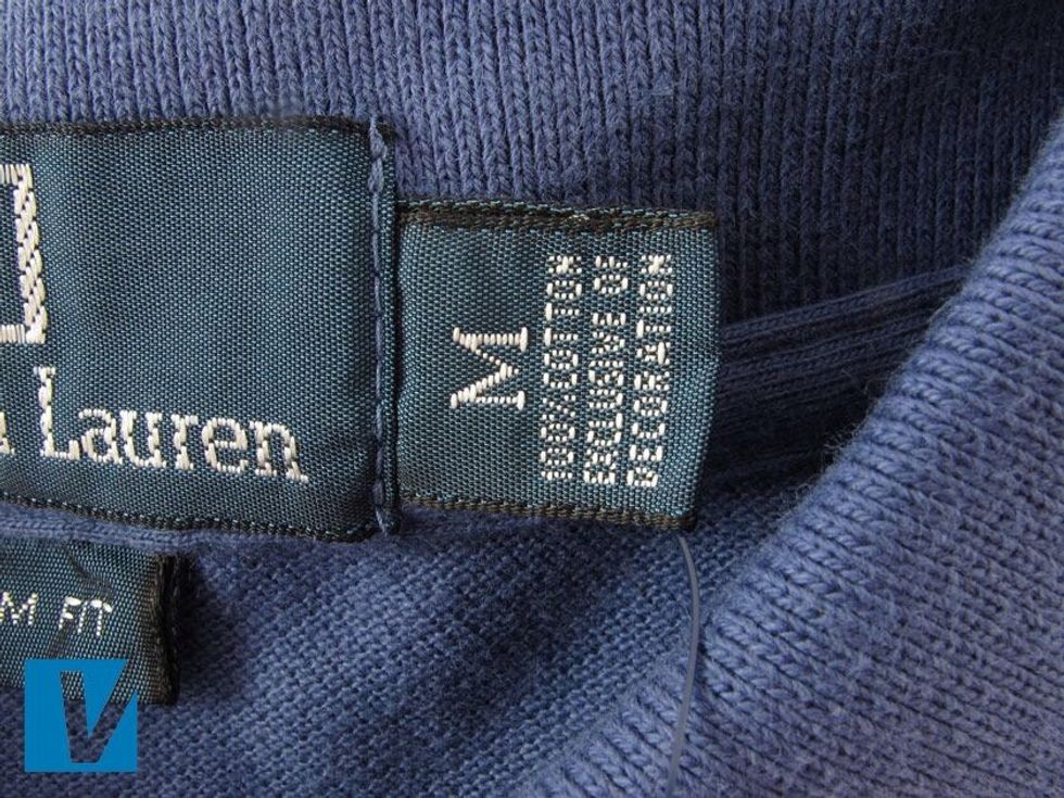 A Polo by Ralph Lauren polo features a size label usually to the right side of the main collar label.