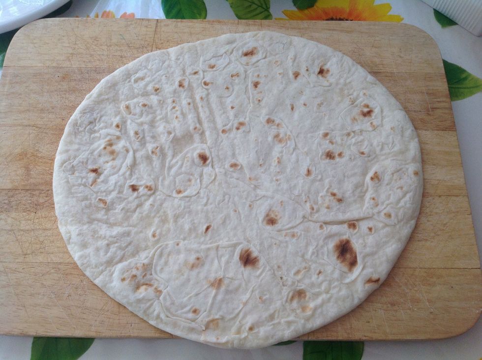 A precooked piadina, if you don't have the time to prepare it using wheat flour, lard, water and salt,