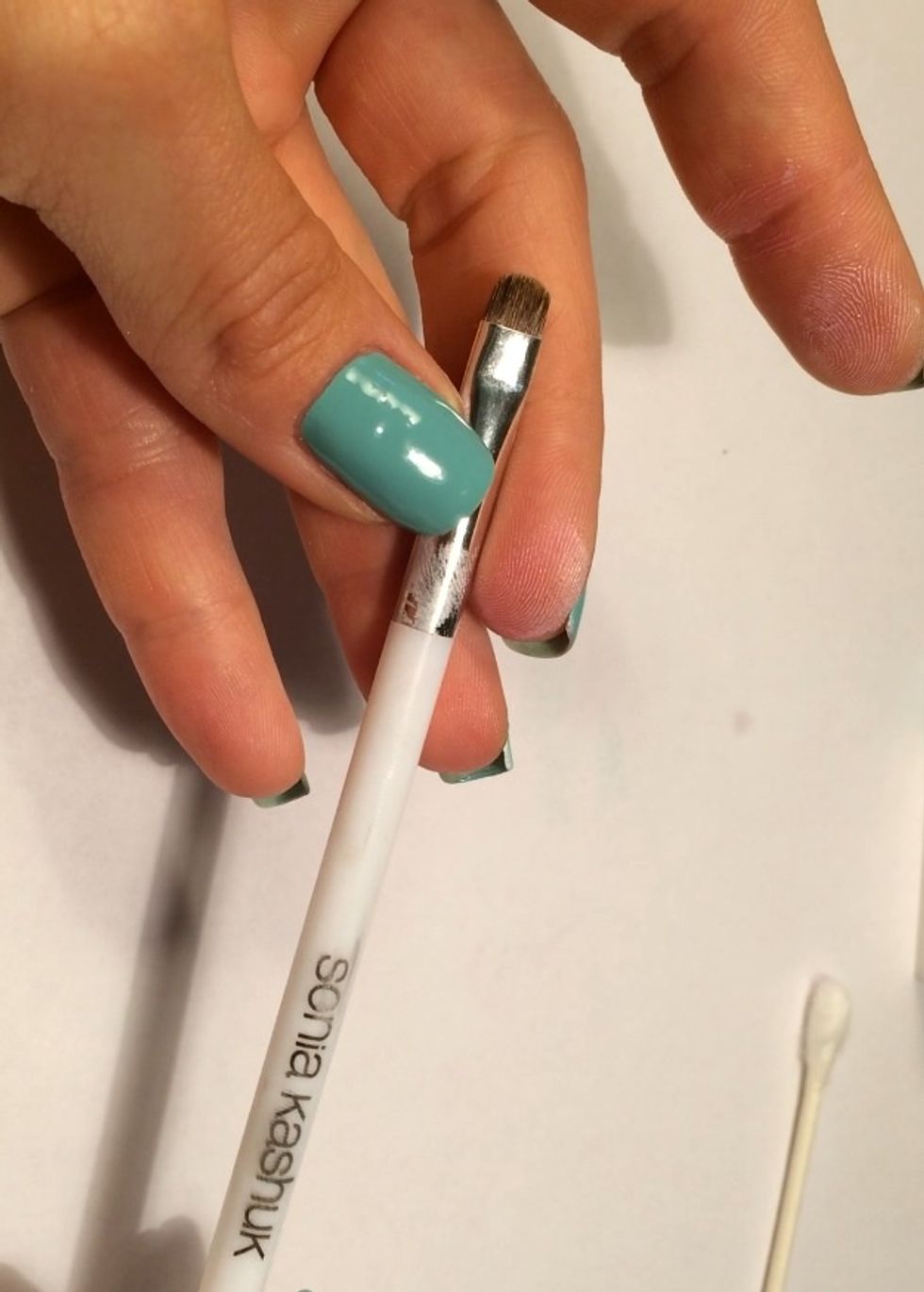 A Q-tip or make-up brush for clean up.