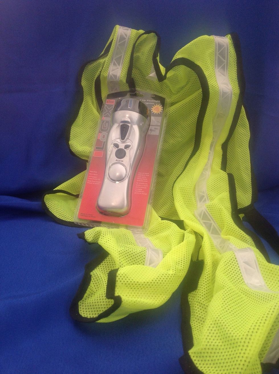 A reflective vest and wind-up flashlight can be very useful. Hang the vest in a visible location on your car while you are not wearing it. These can be purchased at a local hardware store.