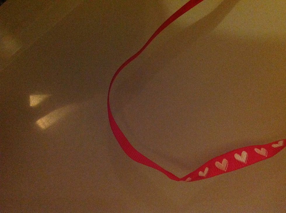 A ribbon, measured around your wrist or head.