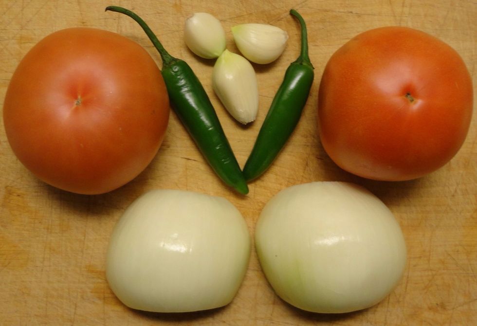 A roasted salsa can be made with tomatoes or tomatillos. Roasting the ingredients enhances the flavors. Fire roasting is better than gas, but I'm in need of a grill (Donations accepted)