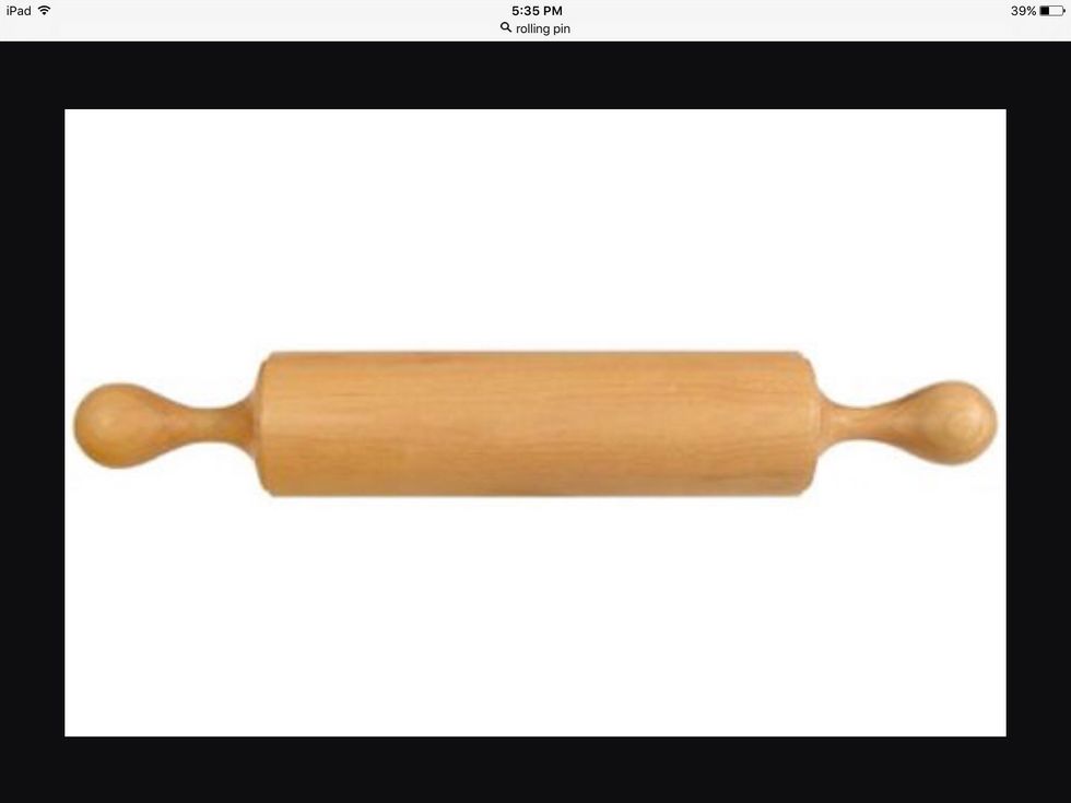 A rolling pin is used to spread out dough. I can use this when I make sugar and gingerbread cookies.