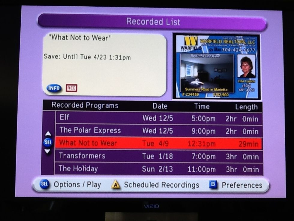 A screen listed your recorded shows will appear on your TV. Use the arrows and blue ok/select button to choose which show you would like to watch.
