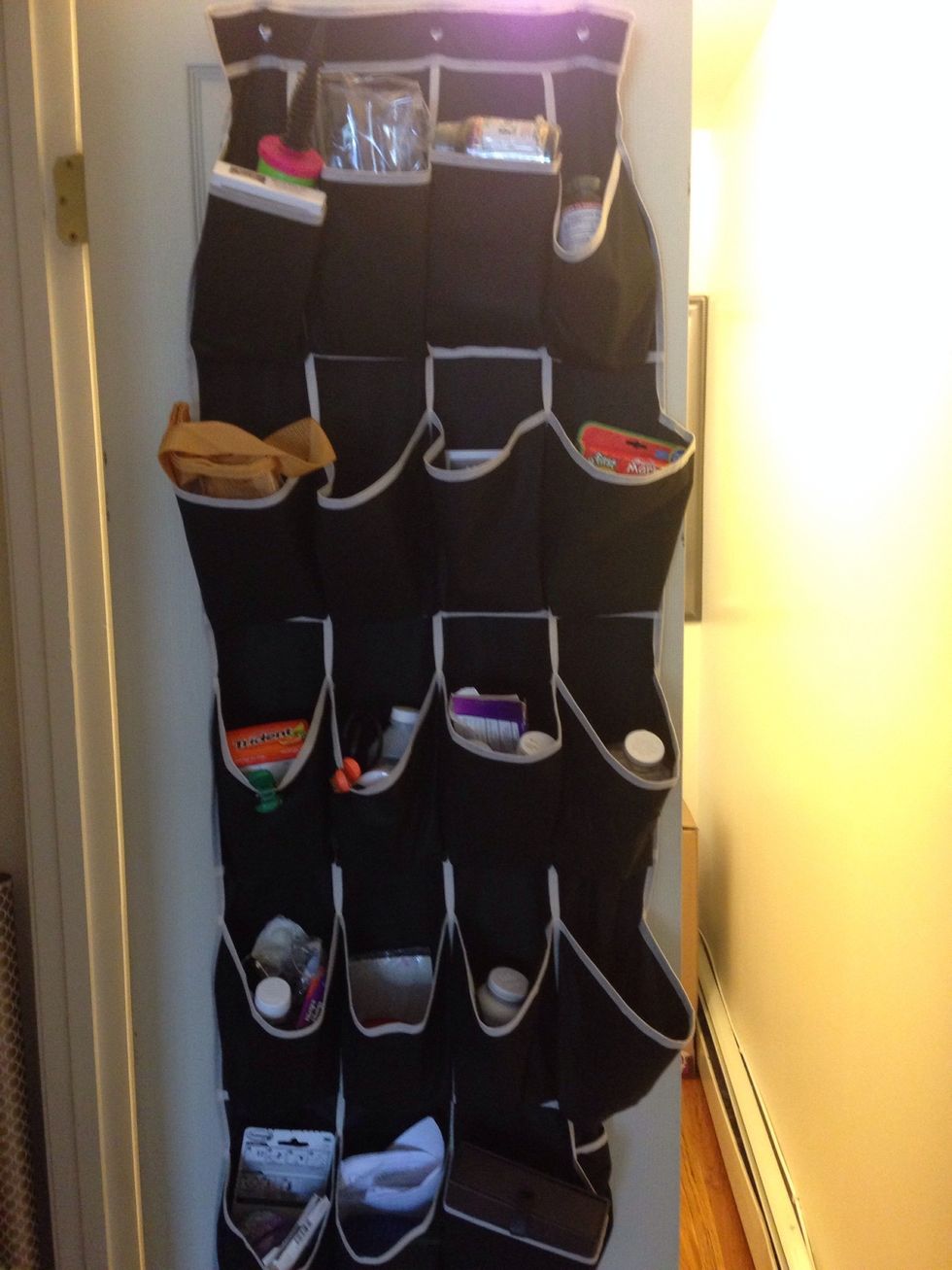 A shoe organizer can be used as an over the door organizer for your medicines or any sort of thing you want to keep handy.