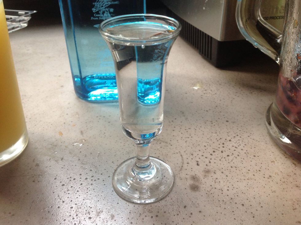 A shot of gin in white sangria. Well, one shot for me. A couple for the pitcher.