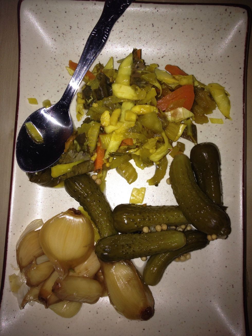 A side of pickled goods is a typical accompaniment. I have Sear Torshi (aged garlic-check my guide on it), Torshi Makhloot (a pickled vegetable mix), and Cornichons.